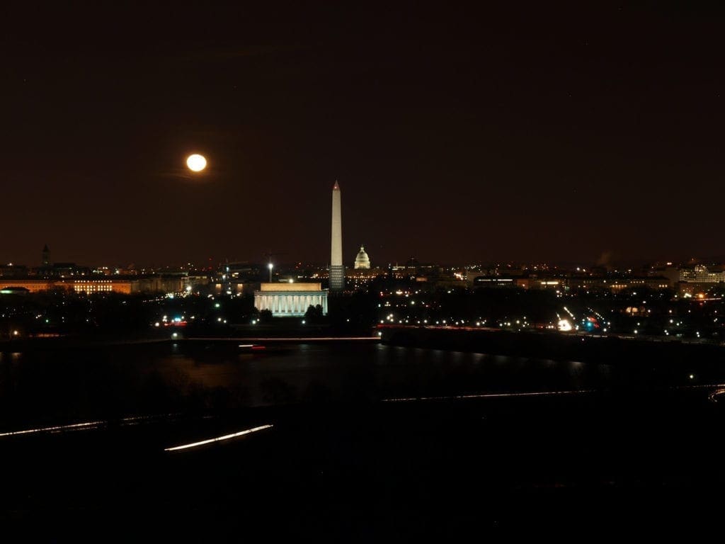 November 2020 - Park of the Month 12 A view across the Potomac River of the Lincoln Memorial, the Washington Monument, and the U.S. Capitol at night.